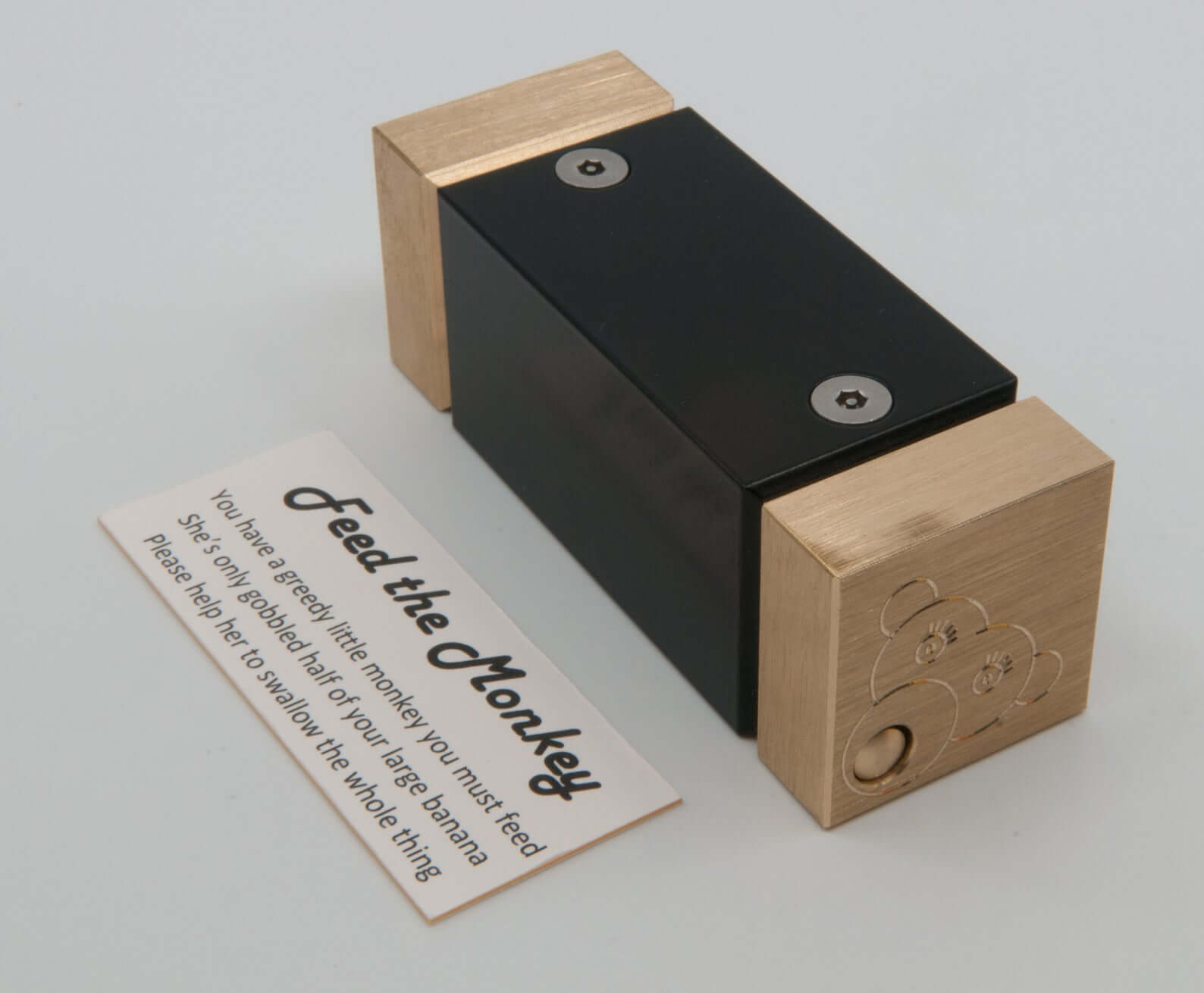 Feed The Monkey Puzzle by two brass monkeys Metal Puzzle Solution