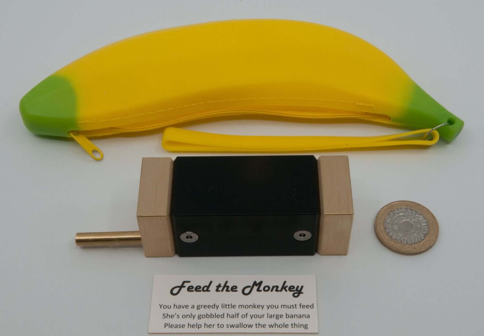 Feed The Monkey Brass Puzzle